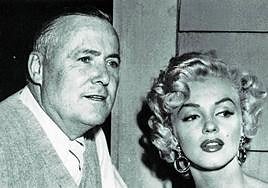 El director estadounidense junto a Marilyn Monroe en un descanso del rodaje de 'Niágara'.