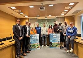 MIembros de la organziación posan con motivo de la presentación del programa esta mañana.