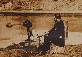 Adolfo Guiard en la punta de Zorroza pintando 'La ría en el desierto' hacia 1897.