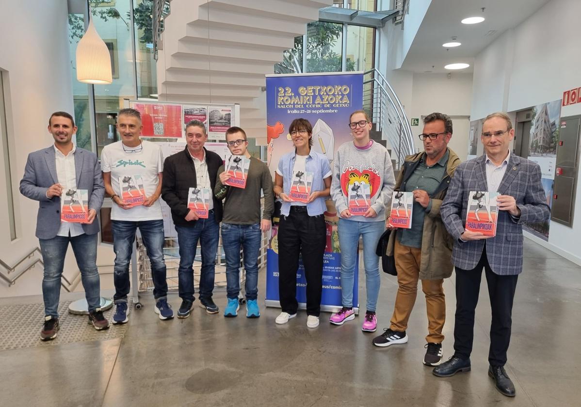 Jon Zugazagoitia, concejal de Deportes de Basauri; Javi Conde, medallista paralímpico; Jose Feijoó, presidente de la asociación de comerciantes de Basauri; Mikel García, atleta; Susanna Martín, dibujante e ilustradora del cómic; Tania Castillo, atleta; el periodista Jon Spinaro y Romualdo Doistua, vicepresidente de los comerciantes de Basauri.