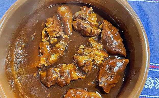 Media ración de las gulescas manitas de guarro.