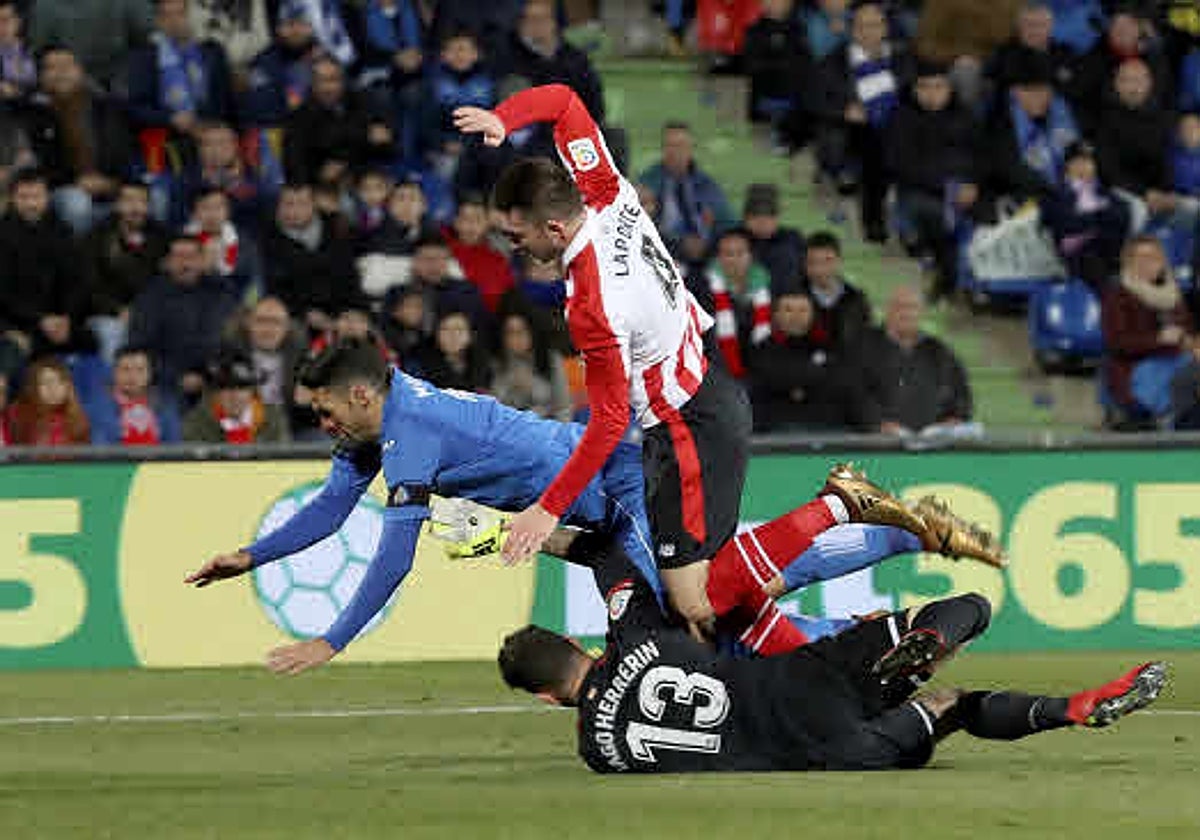 Laporte, Molina y el portero Iago Herrerín en el último partido del francés con el Athletic en Getafe.