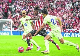 Nico trata de superar a Eric García ante la mirada de Lamine Yamal en el encuentro disputado en San Mamés la pasada campaña.