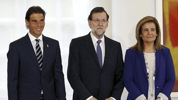 Rafael Nadal, Mariano Rajoy y Fátima Bañez. 