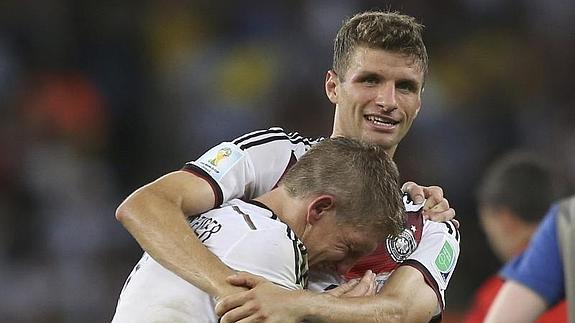 Müller, con Schweinsteiger.