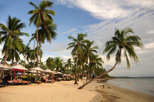 Una de las playas de las islas Fiji, con sus famosas palmeras.