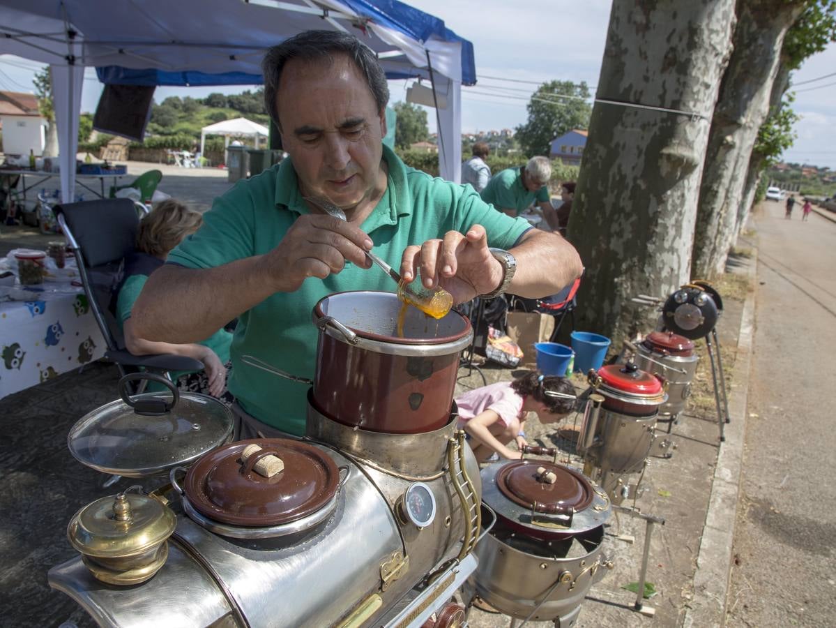 Imágenes del pregón, del concurso de ollas ferroviarias y de la paella solidaria de las fiestas de la Virgen del Carmen de Camargo