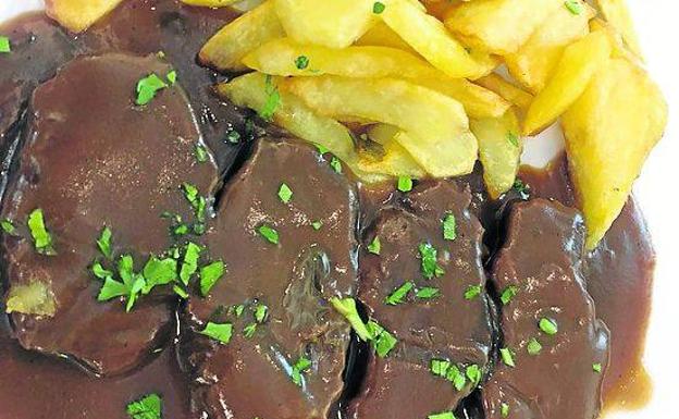 Carrileras con salsa de cerveza negra. 