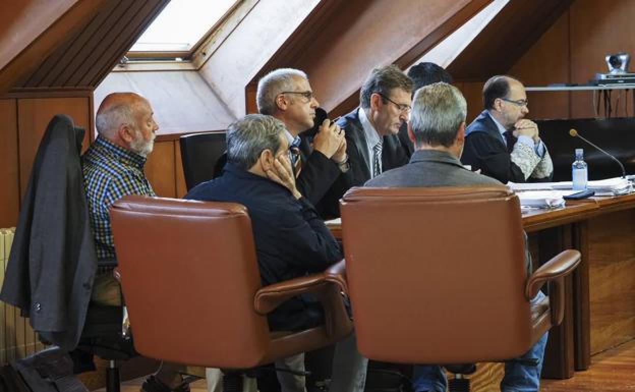 Los tres acusados, durante el juicio.