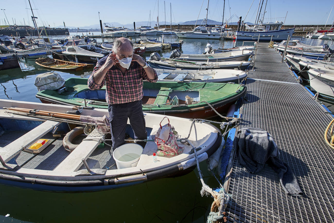 Fotos: Los pescadores recuperan la actividad tras más de dos meses