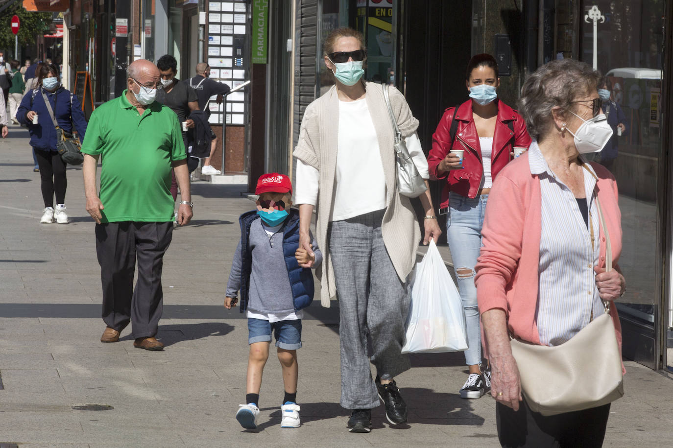 Fotos: Todos con mascarillas en el primer dia de uso obligado