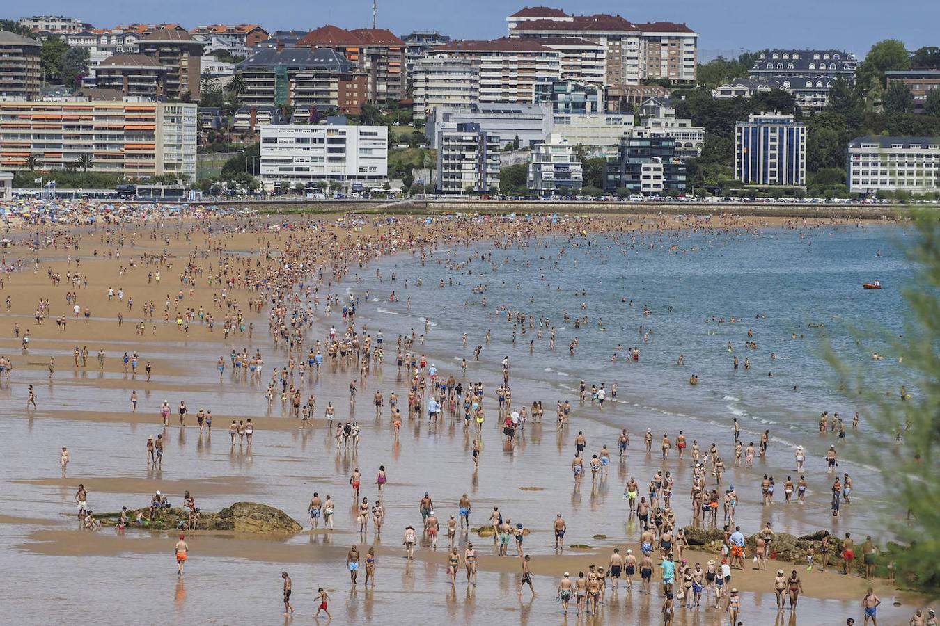 Fotos: Playas llenas de nuevo