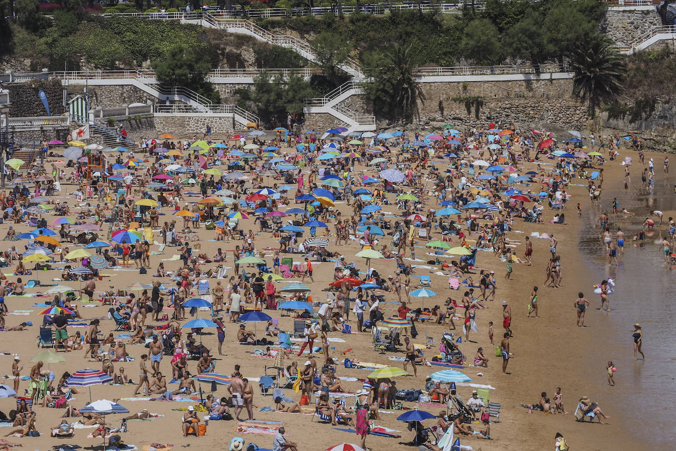 Fotos: Playas llenas de nuevo