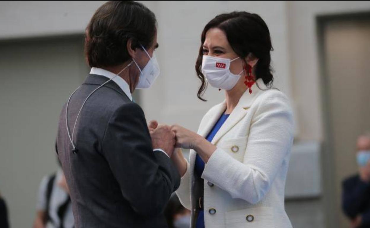 Isabel Díaz Ayuso junto al expresidente José María Aznar, este sábado, en los actos de San Isidro.