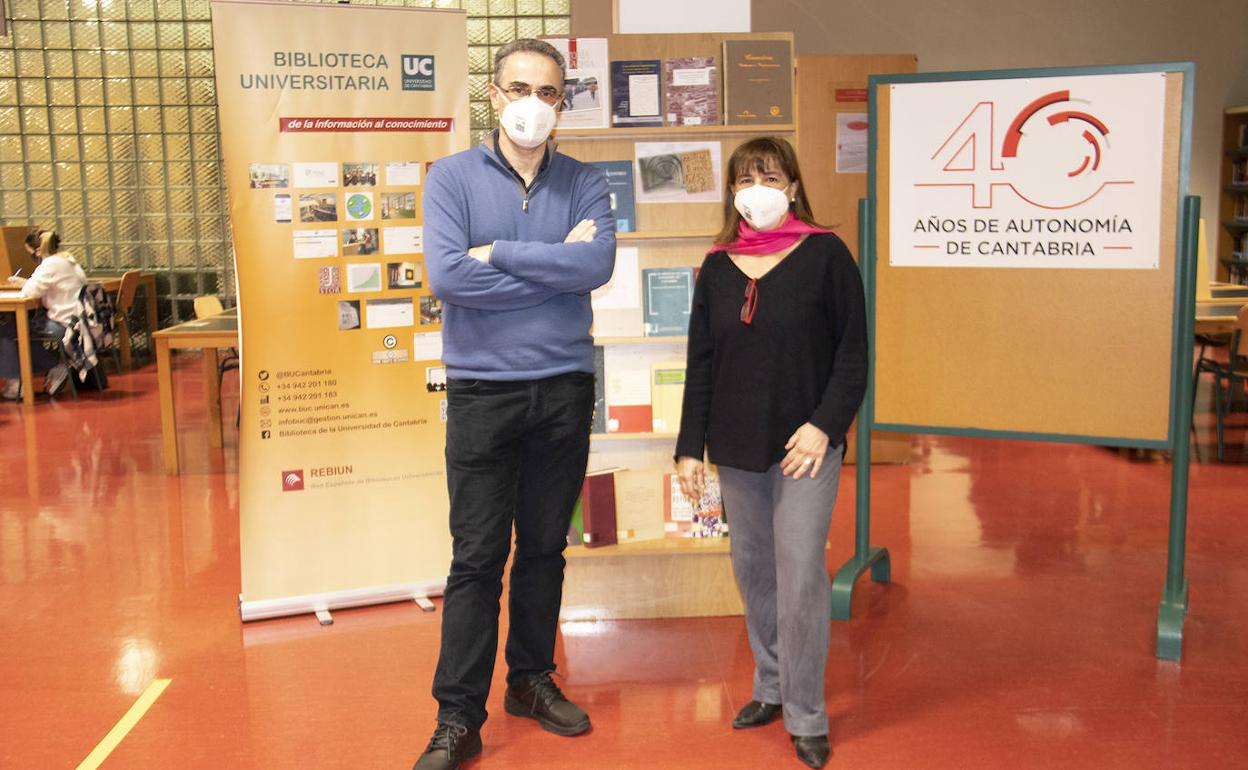Javier de Mata, responsable de la División de Derecho, junto a la directora de la BUC, María Jesús Saiz