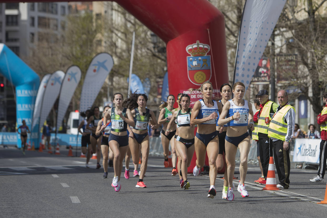 Fotos: Margarita Fuentes-Pila y Mohamed Attaoui vuelan en la Milla de Santander