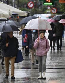 Imagen secundaria 2 - Sábado frío, pasado por agua y con fuerte oleaje en Cantabria