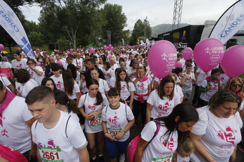 Fotos: Miles de personas participan en la marcha contra el cáncer de Los Corrales