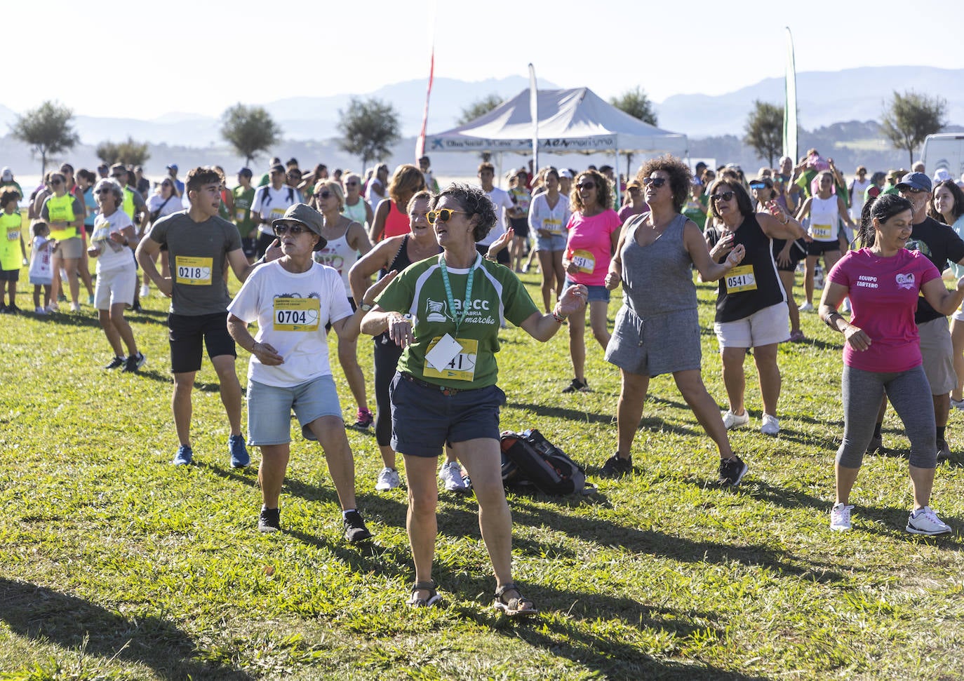 Fotos: Multitudinaria Marcha de las Cinco Playas en Santander