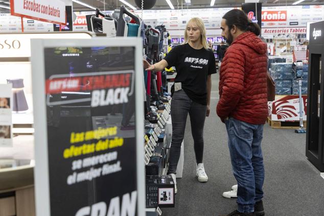 Fotos: Colas para comprar en el Viernes Negro