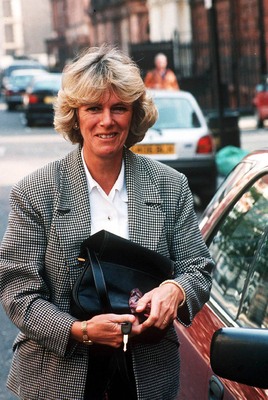 En 1995 Camilla con blazer de cuadros. 