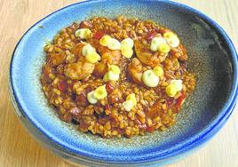 Arroz meloso de mejillones y gambas.