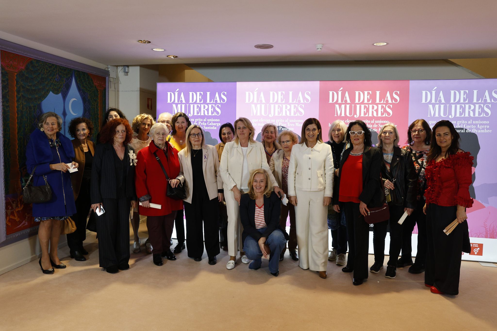 La presidenta de Cantabria, María José Sáenz de Buruaga; la presidenta del Parlamento de Cantabria, María José Revuelta Gónzalez; y las consejeras de Igualdad y Desarrollo Rural, Begoña Gómez del Río y María Jesús Susinos, respectivamente, asisten al acto conmemorativo del Día Internacional de la Mujer, en el Palacio de Festivales de Cantabria.