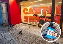 Un encapuchado lanza varias botellas con líquido inflamable en la sede del PSOE durante un acto de Casares