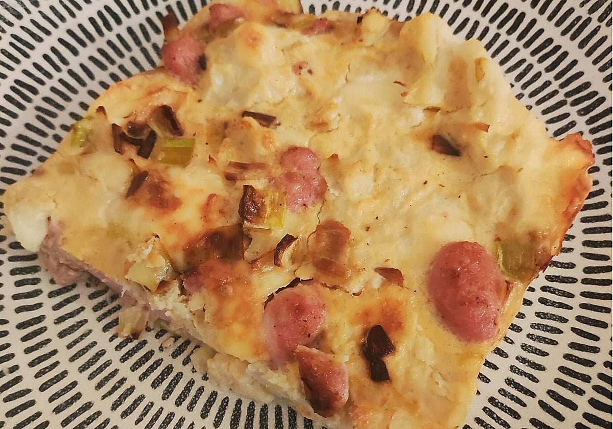 Coliflor con salchichas y queso