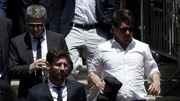 Messi, junto a su padre. 