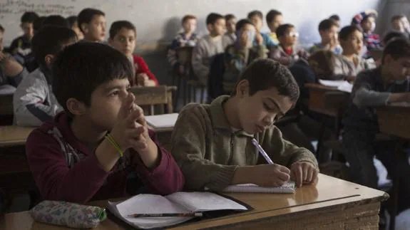 Niños en una escuela de Alepo, Siria.