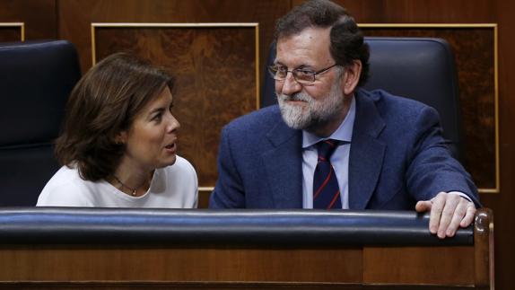 Sáenz de Santamaría, junto a Rajoy.