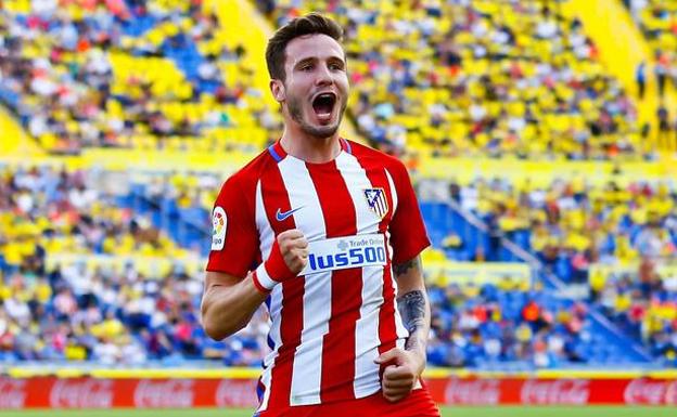 Saúl celebra un gol con el Atlético.