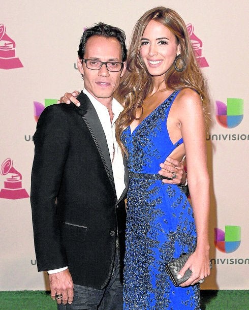 Marc Anthony, abrazado a Shannon de Lima. Arriba, el famoso beso con Jennifer Lopez. :: r.c.