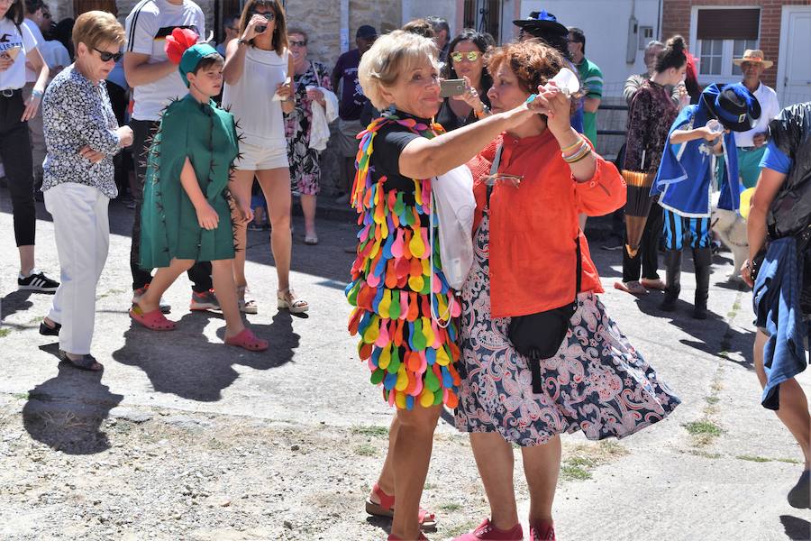 La localidad palentina celebró la fiesta de su patrón, San Lorenzo con un gran recorrido por las calles