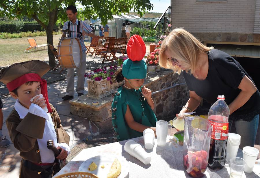 La localidad palentina celebró la fiesta de su patrón, San Lorenzo con un gran recorrido por las calles