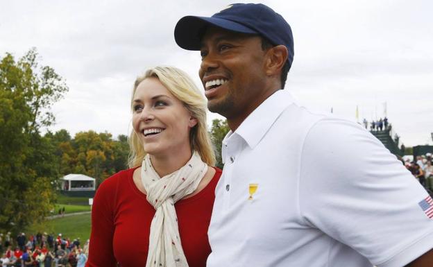 Woods, con Vonn en 2013. 