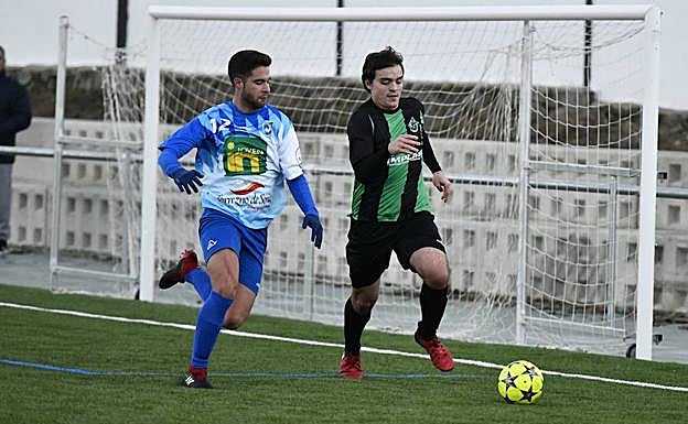 Un momento del partido entre El Espinar-San Rafael y el Calasanz. 