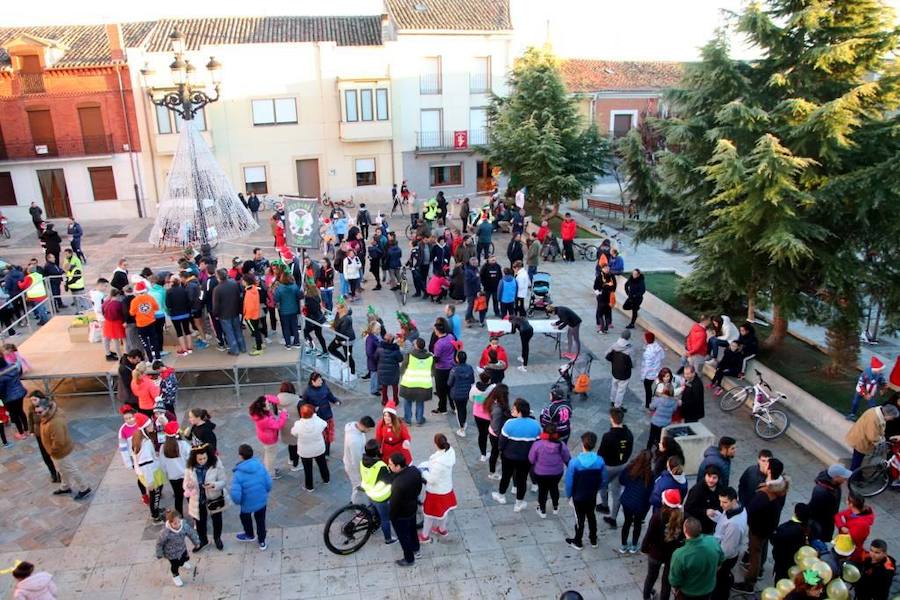 Fotos: Vistosa San Silvestre en Torquemada