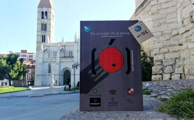 Libro de relatos gastronómicos con la iglesia de La Antigua al fondo, en Valladolid. 