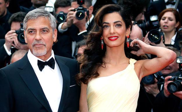 George Clooney y su mujer Amal.