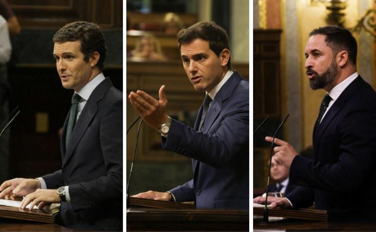 Pablo Casado(i) y Albert Rivera (c) y Santiago Abascal (d) durante sus respectivas intervenciones en la tercera sesión de investidura.