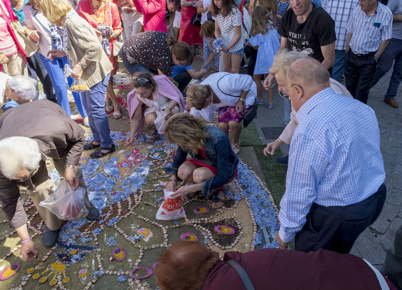 Fotos: Misa y procesión en honor a la Virgen de San Lorenzo