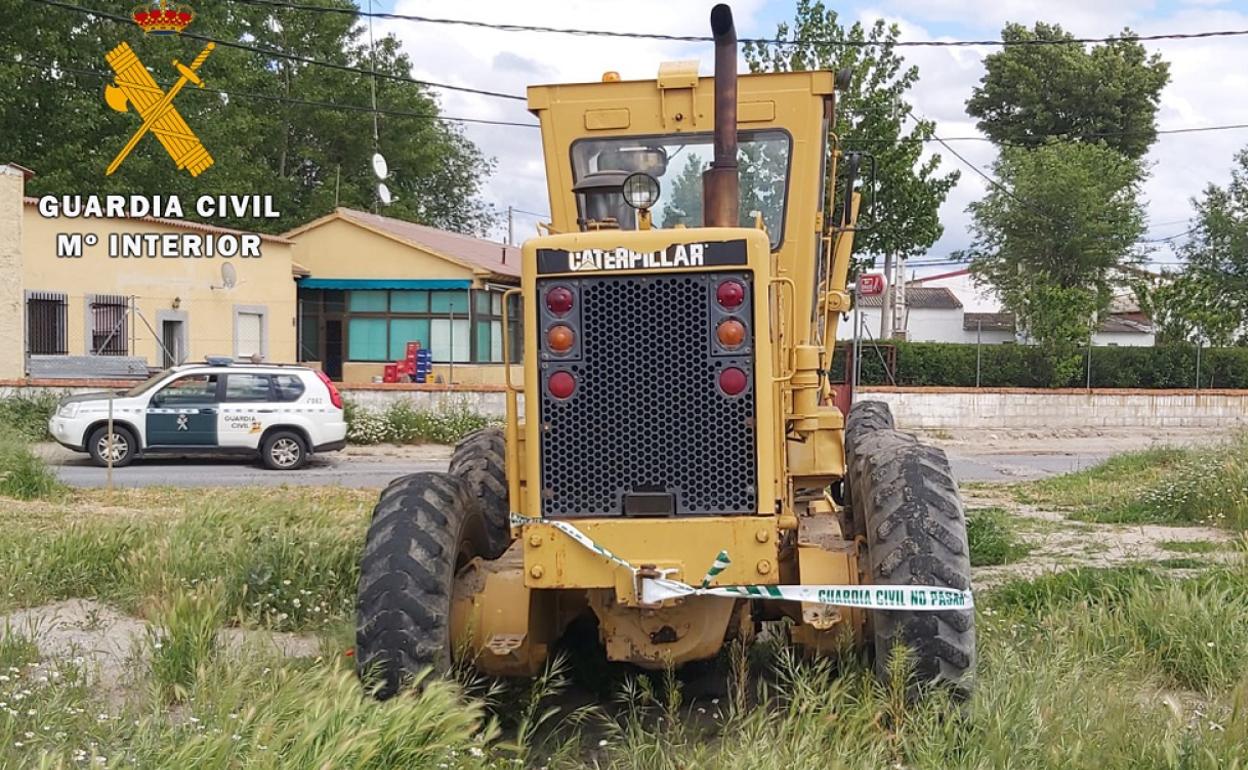 Maquina motoniveladora sustraida