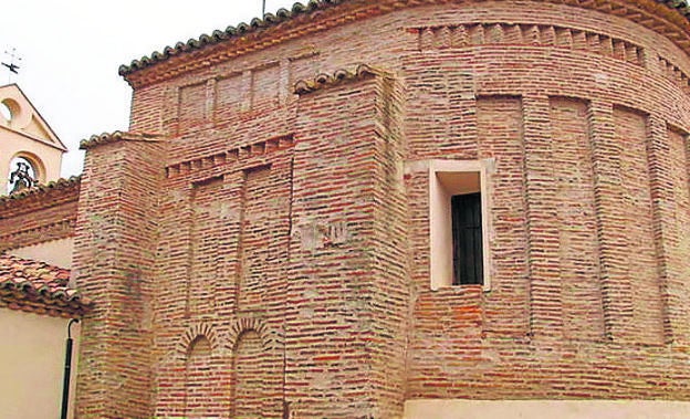 Exterior del ábside de la iglesia parroquial de San Juan de Población de Soto.