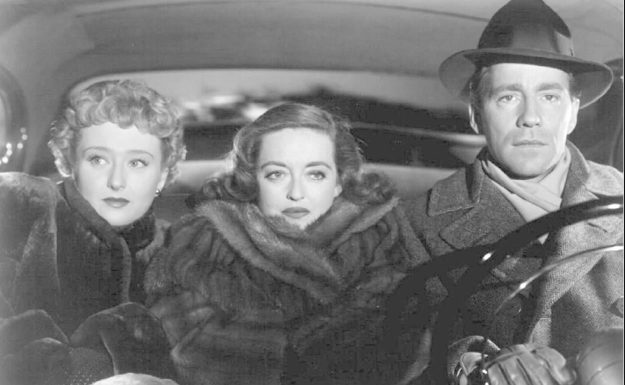 Celete Holm, Bette Davis y Hugh Marlowe, en una escena de la película `Eva al desnudo.