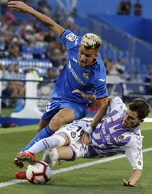 Imagen secundaria 2 - Alejo, con las camiseta de Alcorcón, Eibar y Getafe. 