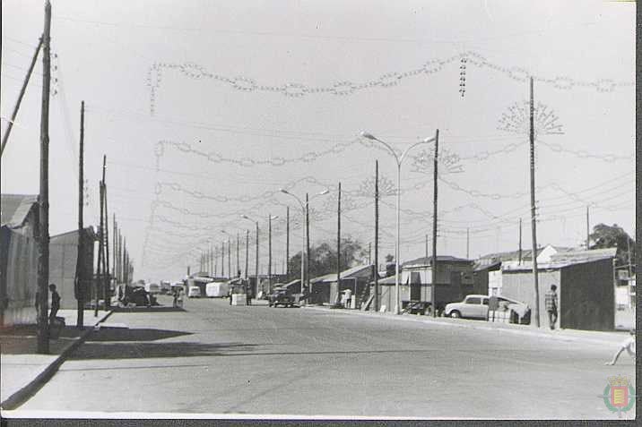 Años 70. Alumbrado y casetas en el Real de la Feria, en La Rubia.