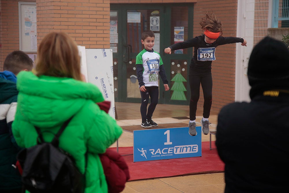 Carbajosa de la Sagrada corre bajo la niebla con sus "Kilómetros Solidarios"