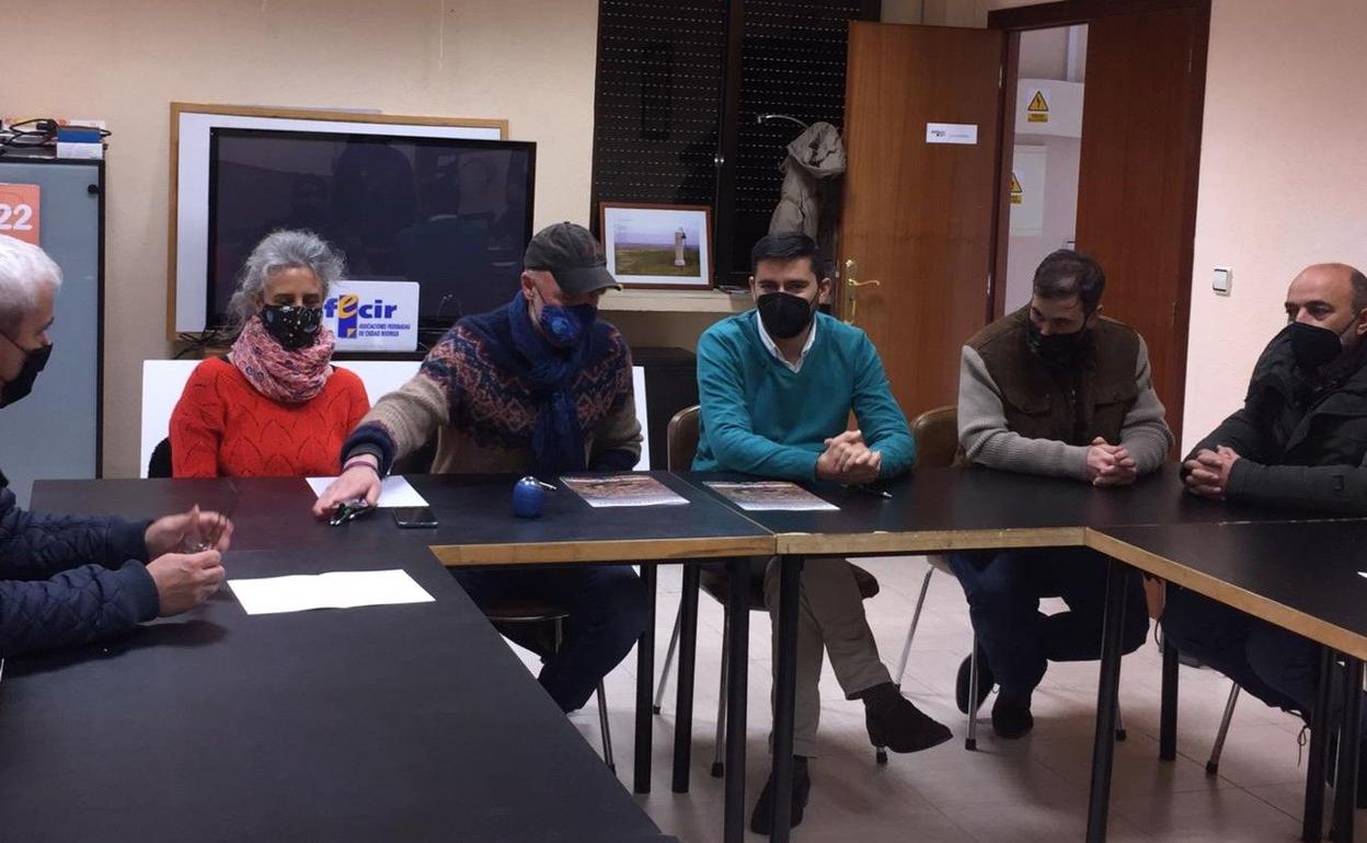 Firma del convenio entre AFECIR y Astróbriga